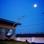full moon rising over studio