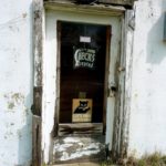Ike's shoe shop - no checks accepted